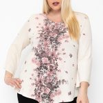 Print Top Featuring A Round Neckline And 3/4 Bell Sleeves