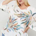 Print Top Featuring A Round Neckline And 3/4 Bell Sleeves