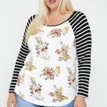 Floral Top Featuring Raglan Style Striped Sleeves And A Round Neck